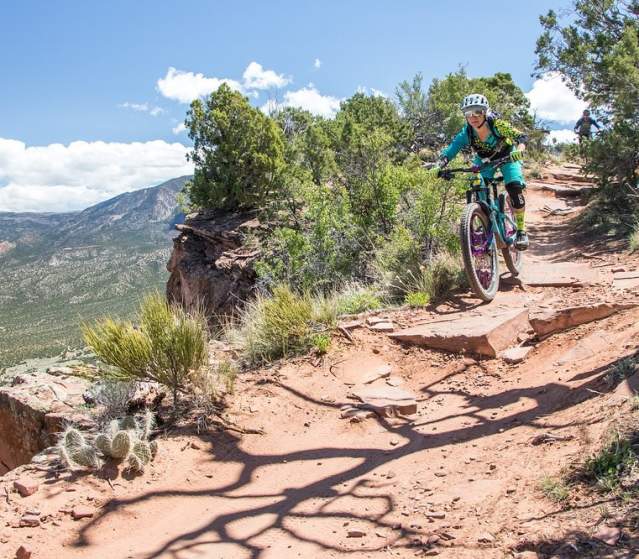 Biker rides down the Palisade Plunge from the top of the Grand Mesa