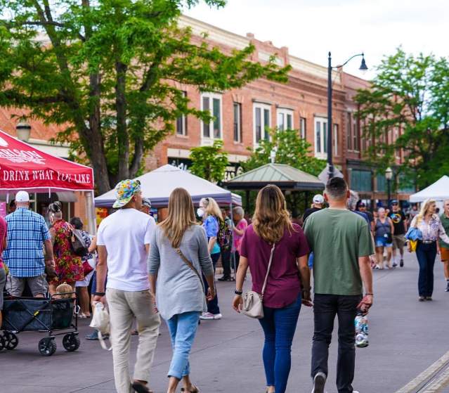 People walking around Market on Main in Downtown Grand Junction